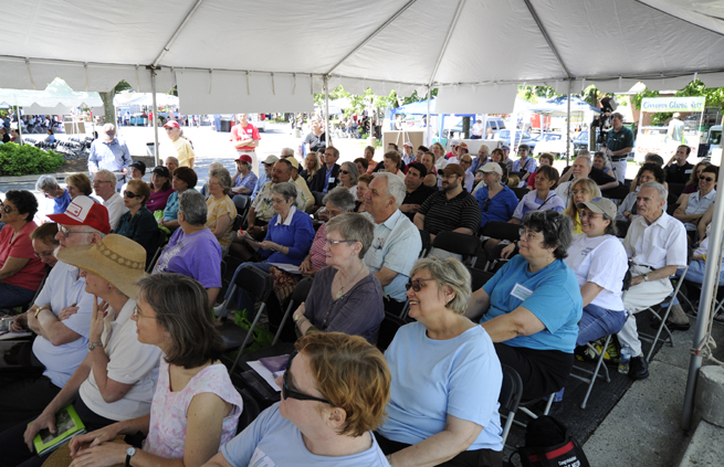 Gaithersburg Book Festival Attendees listen to an author.