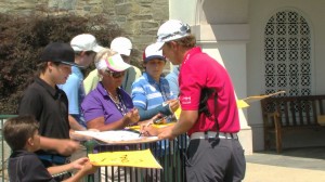 AT&T National Golfer signing autographs