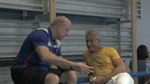 Greg Louganis consults with Olympic Diving Team Coach