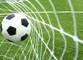image of a soccer ball hitting the net