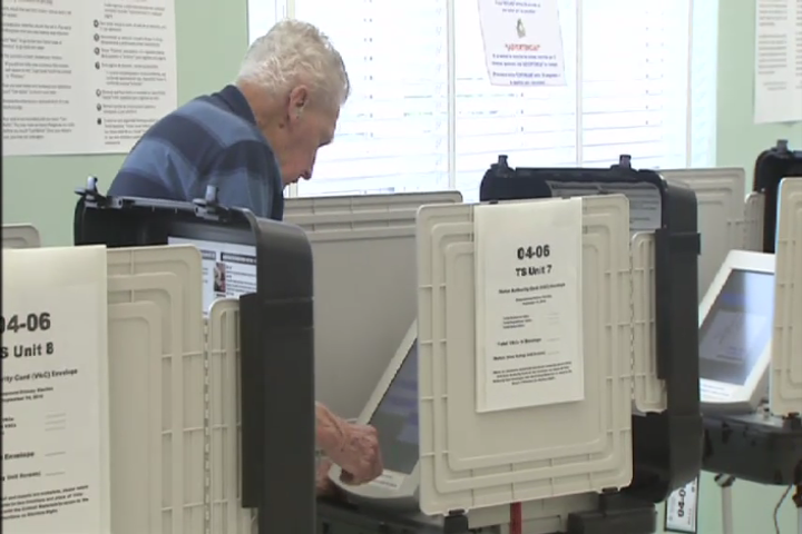 Man in Montgomery County voting booth