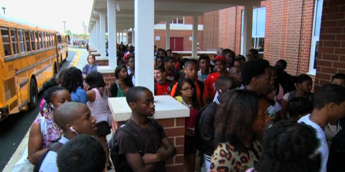 students arriving on first day of school