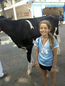 Genevieve Reineke and cow at the Montgomery County Agricultural Fair