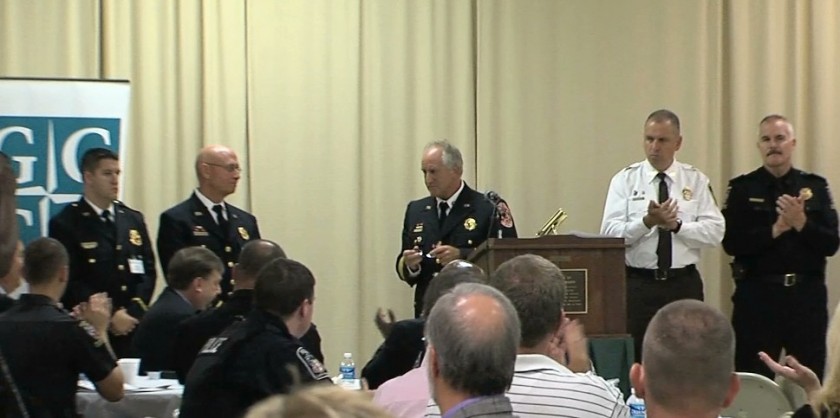 Fire Chief Richard Bowers presents Distinguished Service Citation