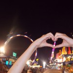 Image of hands in heart pose at Fair