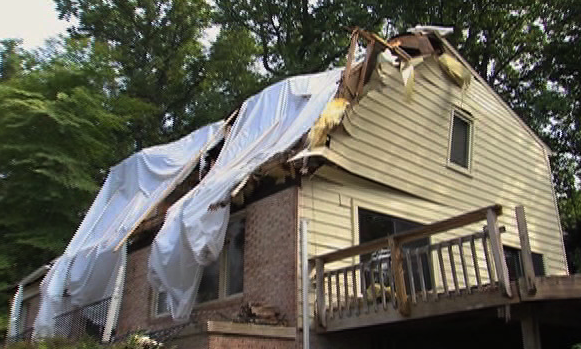 image of house damaged by storm