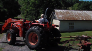 Photo of farmer on tractor