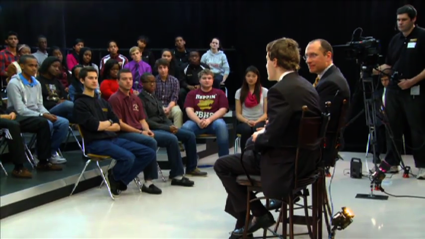 Photo Dr. Starr and students at Paint Branch Student Town Hall