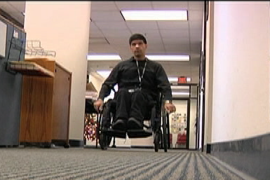 photo of employee in wheelchair at workplace