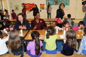 Photo of Valerie Ervin and students at school breakfast