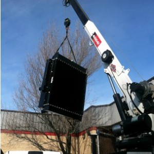 photo of radiator lifted by crane arriving at Manna Food