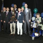 photo Tea-Packaging Device Team with Trophy