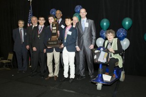 photo Tea-Packaging Device Team with Trophy