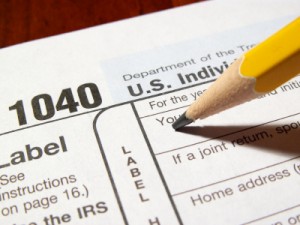 photo of tax form 1040 with pencil