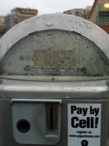 photo parking meter with pay by cell notice