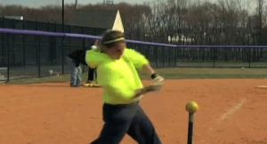 photo woman hitting softball