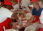 photo volunteers preparing strawberry shortcake
