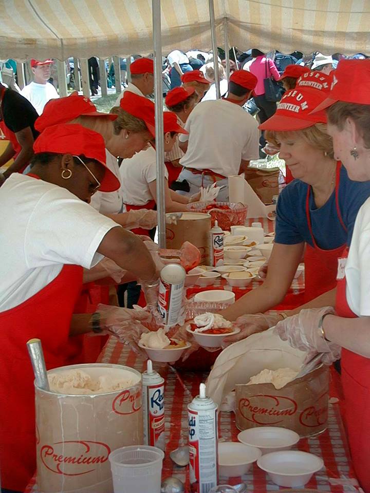 photo volunteers preparing strawberry shortcake