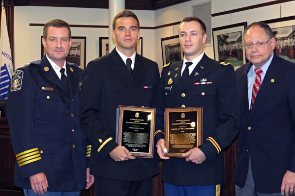 Police Chief Mark Sroka, Ensign John Hunt, Lieutenant Wells Weymouth, Mayor Sidney Katz Photo | City of Gaithersburg/Britta Monaco 