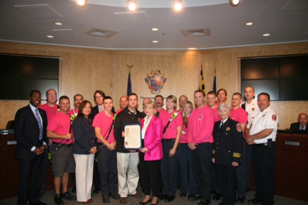 At the ceremonies in Rockville, Councilmember Nancy Floreen, who is a breast cancer survivo, and Councilmembers Craig Rice, Nancy Navarro and Hans Riemer, who have all been personally impacted by breast cancer in their families, were joined by members of the Montgomery County Fire and Rescue Service.