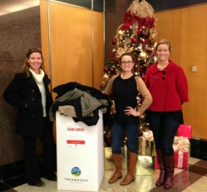 This coat drive photo shows (from left) Barbara Fonseca with sponsor Great Forest Sustainable Solutions; Ashley Lambdin, Director of the Twinbrook Partnership; and Kerri Gates of JBG.