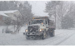 snow plow during storm for slider 450x280