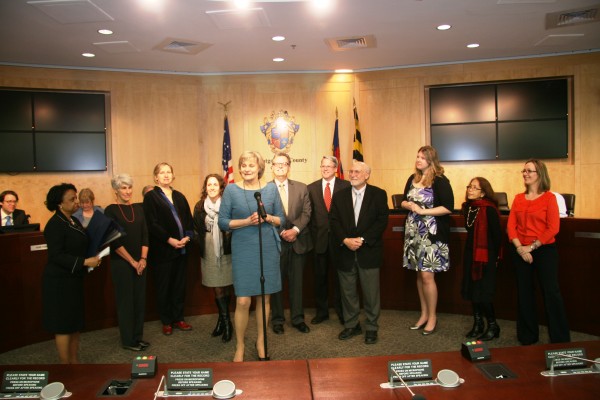 At the ceremonies in Rockville were Silver Spring civic and business leaders, left to right: Mel Tull, Helen Nolan, Connie Rhind Robey, Stephanie Helsing, Jane Redicker, Silver Spring Regional Center Director Reemberto Rodriguez, Councilmember Cherri Branson, Bruce Lee, Rebecca Silvestre, Laura Alin and Alla Shtipelman.