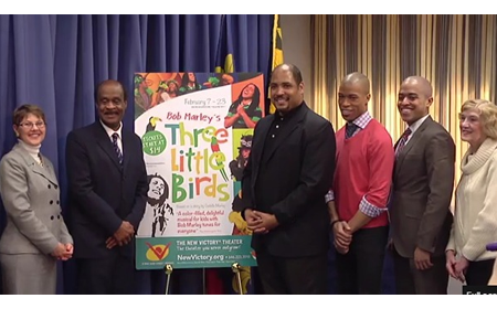 photo county executive ike leggett presenting procalmation to Three Little Birds cast and artistic director