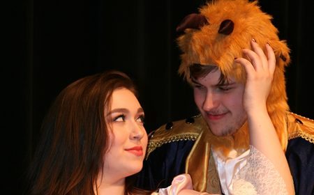 photo of Erica Ferguson as Belle and Luke Schaefer as The Beast