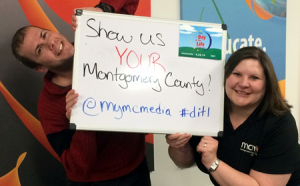 photo of Omri and Mandi with Show us Your Montgomery County DITL sign