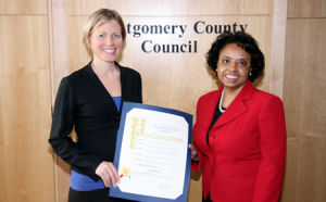 photo of Proclamation for US VegWeek presented to Erica Meier from Cherri Branson