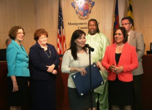 photo of At the ceremonies in Rockville, left to right, were: Judy Ackerman, vice president and provost of the Montgomery College Rockville campus; Carolyn Terry and Rodney Redmond, instructional deans for humanities; Councilmember Nancy Navarro; and Mike Mills, director of the Distance Learning Association.