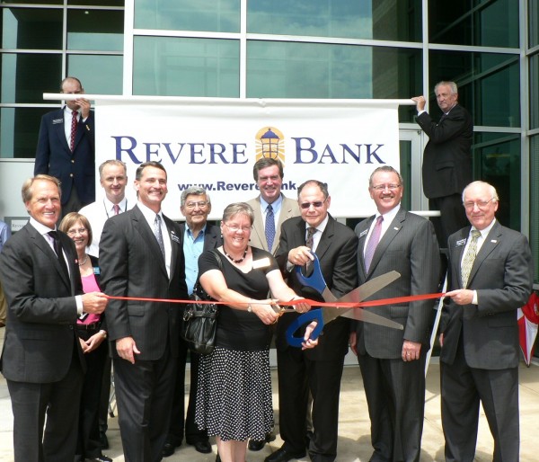 (l:r) Henry Posko, Director, Revere Bank; Marilyn Balcombe, GGCC Executive Director; Terry Forde, President & Chief Executive Officer, Adventist HealthCare; Kenneth Cook, President & Vice Chairman, Revere Bank; Sidney Kramer, former County Executive & State Senator; Cathy Drzyzgula, City of Gaithersburg Councilmember; Doug Duncan, Regional Board Member, Revere Bank and Candidate, Montgomery County Executive; Mayor Sidney Katz, City of Gaithersburg Mayor; Andrew Flott, Chief Executive Officer, Revere Bank; Richard Yocum, Director, Revere Bank at the Gaithersburg-Germantown Chamber conducted Ribbon Cutting Ceremony for Revere Bank in Gaithersburg on June 13, 2014.  (Photo credit – Laura Rowles, GGCC Director of Events & Marketing) 