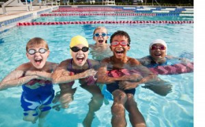 photo of youth in pool with happy faces