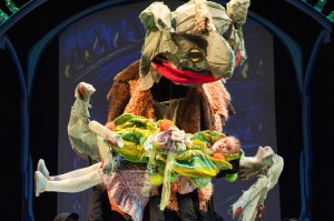 photo of Hungry Fleshlumpeater (Matthew Schleigh), the biggest, baddest giant, mistakes Sophie (Megan Graves) for a snozzcumber in THE BFG at Imagination Stage through August 10.