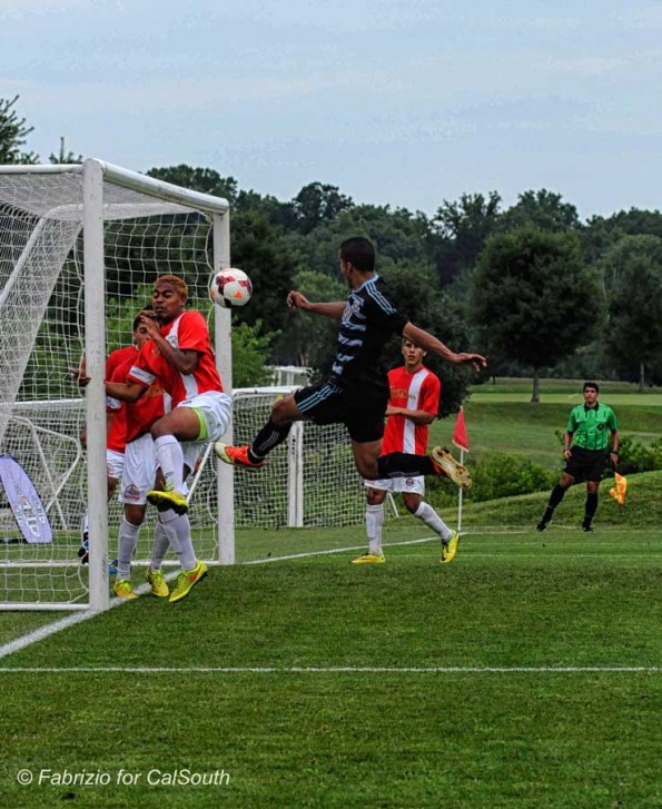 photo of A Lehigh Valley United player's attempt at a goal is blocked by the champions Santa Barbara SC White in the Boys U18 round.