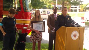 photo of Officer Gamard, Quest, Eva Soderstrom, Craig Rice at ceremony honoring Eva Soderstrom with Citizen's Public Safety Award