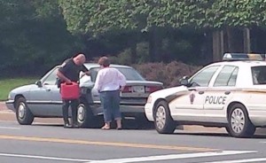 photo of Police officer helping motorist