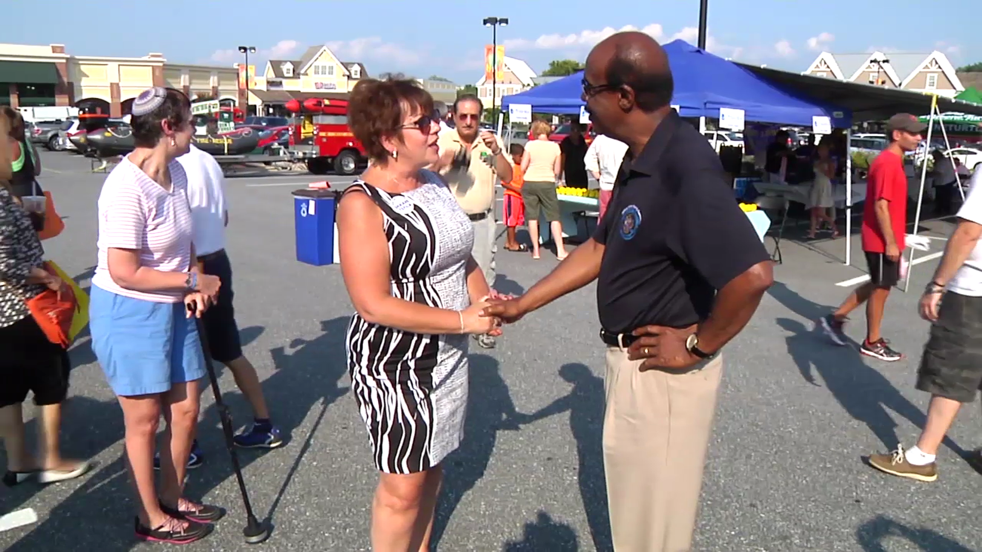 photo of County Exec Leggett talking with Olney resident at National Night Out Aug 5
