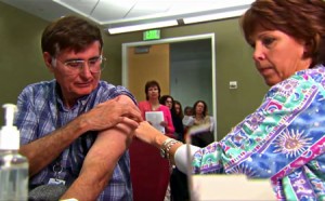 photo of man receiving vaccination