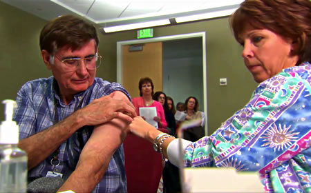 photo of man receiving vaccination