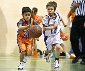 photo of youth playing basketball