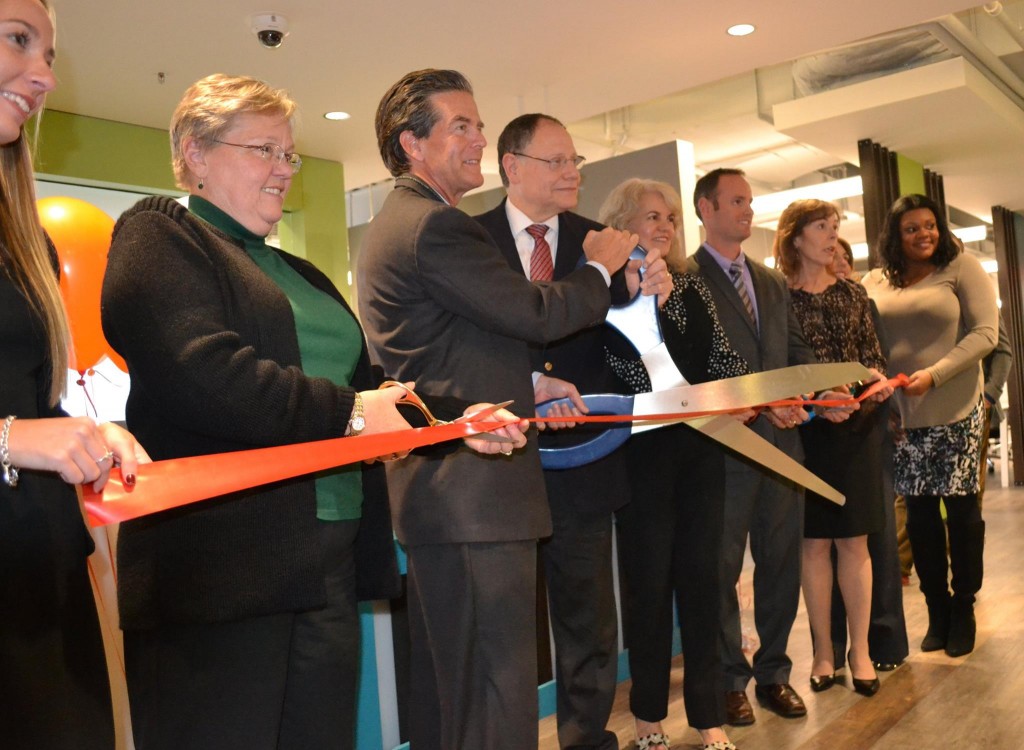 (l:r) Colby Wright, Executive Administrator, Launch Workplaces; Cathy Drzyzgula, City of Gaithersburg Councilmember; Lex Birney, CEO of The Brick Companies; City of Gaithersburg Mayor Sidney Katz; Kathleen Mayer, First National Bank and GGCC Board member; Mark McMahon, Director of Operations, Launch Workplaces; Cindie Harrison, Montgomery County Department of Economic Development; Laurie Edberg, Special Assistant to Senator Barbara Mikulski; Nichelle Dyson, Executive Administrator, Launch Workplaces, at the Gaithersburg-Germantown Chamber conducted Ribbon Cutting Ceremony for Launch Workplaces in Gaithersburg on November 6, 2014. 