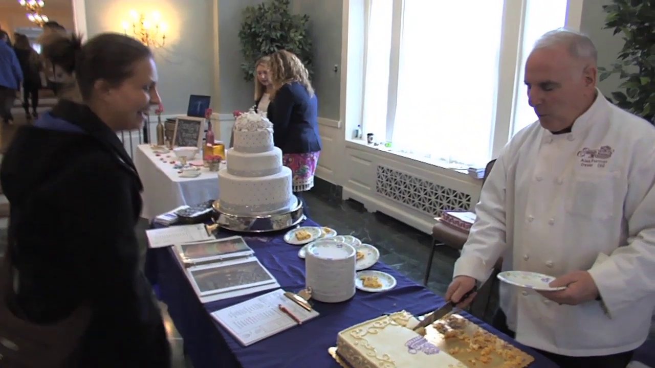 photo of cake sampling at the 16th annual wedding expo at Rockville's Glenview Mansion