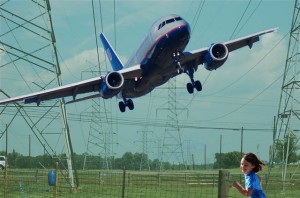 plane through powerlines