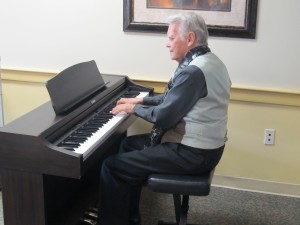 John Phillips, a resident of Riderwood, performs some of his favorite pieces at the opening of the February meeting of the retirement community’s Piano Club. 