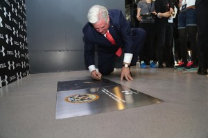 Governor Larry Hogan leaves his handprint. 