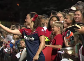 Spirit player takes selfie with fans after aug 1 game against houston dash