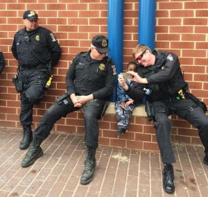 Montgomery County Police SERT Officers engage with children in Baltimore in April.