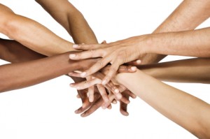 Pile of hands isolated on white, Caucasian, African American, Hispanic race.